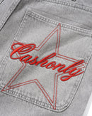 Cash Only Club Denim Shorts Washed Grey, baggy denim short met brass logo knop en 3D embroidery op de achterzak, taillemaatjes 28-42, verkrijgbaar bij Revert 95 Haarlem