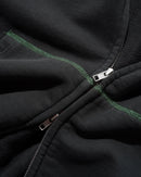 Butter Goods Drummer Zip-Thru Hoodie in Washed Black, heavyweight cotton fleece garment wash full zip-through hoodie met Drummer branding op de voorkant relaxed fit front pockets en ribbed trims, verkrijgbaar bij Revert 95 Haarlem