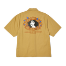 HUF Fantasies SS Work Shirt in Tan met "I Dream of Fantasies" backprint, vrouwenportret in doornenkrans en goudkleurige sterren, verkrijgbaar bij Revert 95 Haarlem