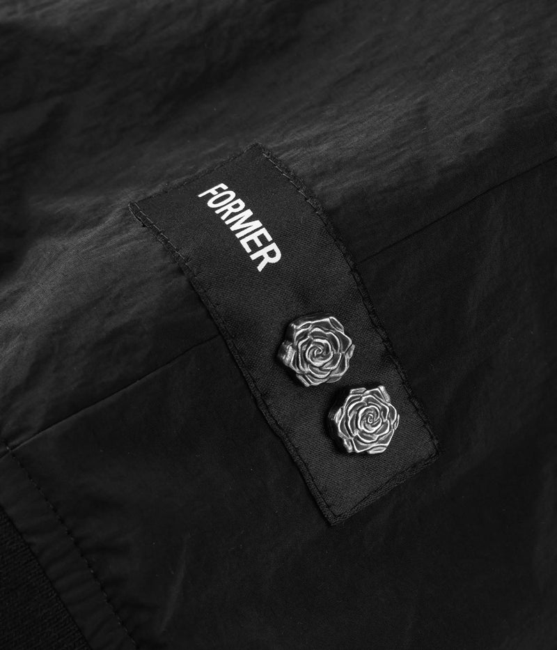 Former Merchandise Craig Anderson Weeping Jacket Black – zwart signature jacket van Craig Anderson met Weeping-details en Former-branding