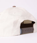 Former Proscription Cap Bone – washed 6-panel cap met Proscription graphic in Bone kleur