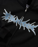 Butter Goods Nail Logo Zip-Thru Hoodie in Black, heavyweight cotton fleece full zip-through hoodie met large embroidered Nail Logo op de voorkant relaxed fit front pockets en ribbed trims, verkrijgbaar bij Revert 95 Haarlem
