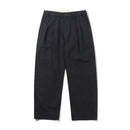 Butter Goods Pleated Trousers in Washed Black, 100% cotton herringbone twill baggy fit broek met dubbele plooien op de voorkant welt pockets met flap en button closure en belt loops met internal drawcord, verkrijgbaar bij Revert 95 Haarlem