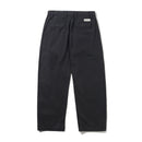 Butter Goods Pleated Trousers in Washed Black, 100% cotton herringbone twill baggy fit broek met dubbele plooien op de voorkant welt pockets met flap en button closure en belt loops met internal drawcord, verkrijgbaar bij Revert 95 Haarlem