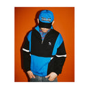 Hélas Caps Hoop Quarter Zip in Blue/Black met colour-block panelen en geborduurd Umbrella logo, verkrijgbaar bij Revert 95 Haarlem