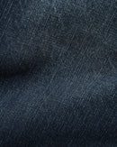 Butter Goods Santosuosso Denim Jeans in Streaky Navy, 100% cotton denim ultra baggy tapered fit met contrasting stitching geborduurd Philly coin stash pocket PU belt patch en flag label branding, verkrijgbaar bij Revert 95 Haarlem