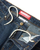 Butter Goods Santosuosso Denim Jeans in Streaky Navy, 100% cotton denim ultra baggy tapered fit met contrasting stitching geborduurd Philly coin stash pocket PU belt patch en flag label branding, verkrijgbaar bij Revert 95 Haarlem