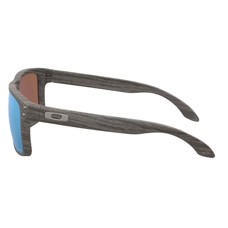 Bestel de Oakley Holbrook Woodgrain Prizm Deep Water Polarized veilig, gemakkelijk en snel bij Revert 95. Check onze website voor de gehele Oakley collectie, of kom gezellig langs bij onze winkel in Haarlem.	