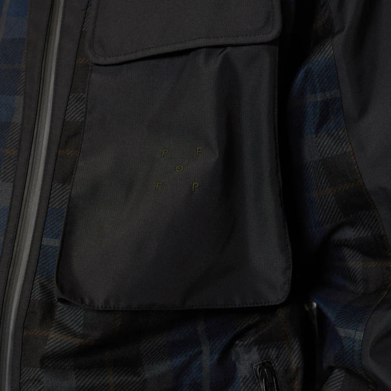 Bestel de Pop Trading Company big pocket hooded jacket black/navy check snel, gemakkelijk en veilig bij Revert 95. Check onze website voor de gehele Pop Trading Company collectie of kom gezellig langs bij onze winkel in Haarlem.