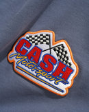 Cash Only Service Zip Thru Hood in Washed Navy met mineral wash behandeling, geborduurde patches all over en volledige ritsluiting, verkrijgbaar bij Revert 95 Haarlem