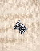 Butter Goods Sketch Waffle Crewneck in Cream Red, 430gsm 100% katoen waffle long sleeve top met raglan mouwen elasticated cuffs en hem en embroidered Sketch patch op de voorkant, verkrijgbaar bij Revert 95 Haarlem
