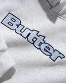 Butter Goods Stripe Logo Applique Pullover Hoodie in Ash, 420gsm mineral wash cotton fleece relaxed fit hoodie met large embroidered stripe logo applique op de voorkant kangaroo pocket en ribbed trims, verkrijgbaar bij Revert 95 Haarlem