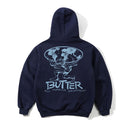 Butter Goods Terrain Pullover Hoodie in Navy, 420gsm mineral wash cotton fleece relaxed fit hoodie met split panel hood kangaroo pocket ribbed trims en screen printed Terrain branding op borst en rug, verkrijgbaar bij Revert 95 Haarlem
