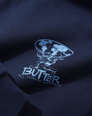Butter Goods Terrain Pullover Hoodie in Navy, 420gsm mineral wash cotton fleece relaxed fit hoodie met split panel hood kangaroo pocket ribbed trims en screen printed Terrain branding op borst en rug, verkrijgbaar bij Revert 95 Haarlem
