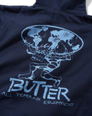 Butter Goods Terrain Pullover Hoodie in Navy, 420gsm mineral wash cotton fleece relaxed fit hoodie met split panel hood kangaroo pocket ribbed trims en screen printed Terrain branding op borst en rug, verkrijgbaar bij Revert 95 Haarlem