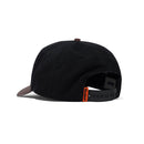 Butter Goods Tide 5 Panel Cap in Washed Black Dusk, washed cotton twill pinch front snapback met contrast peak in Dusk embroidered eyelets en embroidered branding op de voorkant, verkrijgbaar bij Revert 95 Haarlem