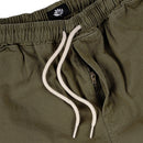 Magenta Skateboards Loose Pants in Khaki, 100% katoen baggy fit broek met tapered legs elastische taille drawstring metalen ritsluiting en Magenta Plant logo op de rechter achterzak gemaakt in Europa, verkrijgbaar bij Revert 95 Haarlem