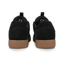 DC Shoes Astrix S in Black/Gum/White met Super Suede upper, TPR rubber kwart logo en cupsool met DC grip patroon, verkrijgbaar bij Revert 95 Haarlem