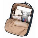 Doughnut Macaroon Meditative Dark Backpack in Midnight Blue, 16 liter dagrugzak van 900D poly canvas met lederen afwerking en laptopvak tot 14 inch, verkrijgbaar bij Revert 95 Haarlem