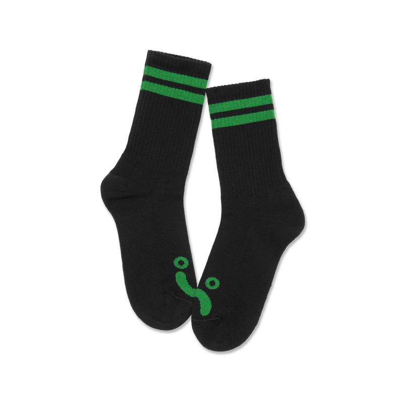 Polar Skate Co Rib Socks Happy Sad Black Green – ribgebreide sokken van katoenmix met Happy Sad-logo en zwarte kleur met groene details.