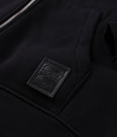 Former Crux Lined Zip Hood Black – premium lined zip hoodie met subtiele branding