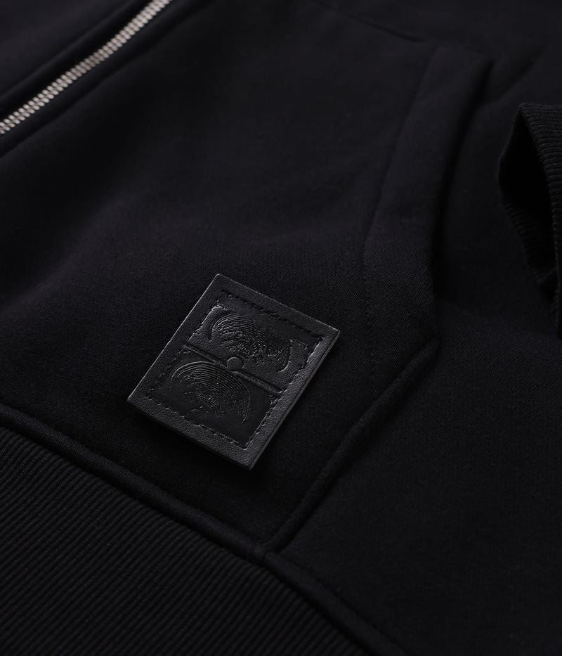 Former Crux Lined Zip Hood Black – premium lined zip hoodie met subtiele branding